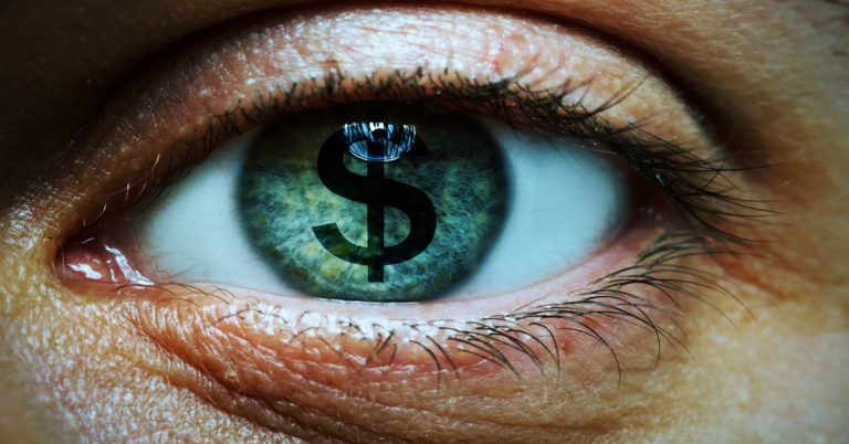 A person's eye expressing manifestation with a dollar sign.